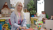 © Krakenimages.com - Young blonde woman preschool teacher stressed sitting on table at kindergarten