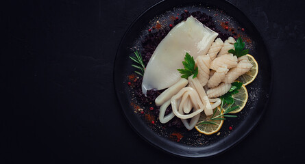 Fresh squid , raw, carcass, cut into rings, top view, no people,