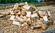 Pile of chopped logs for a wood burning stove as an alternative to oil or gas