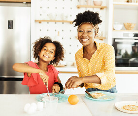 Wall Mural - family child kitchen food daughter mother love eating preparing pancake breakfast  happy together black dessert