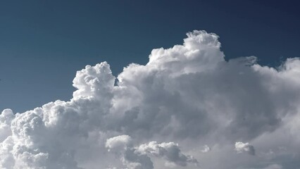 Poster - Slow motion shot of clouds moving in the blue sky