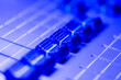 Sound mixer control panel close-up. Select focus. Shallow depth of field