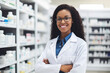 © aicandy - Confident female pharmacist with a warm smile and a reassuring demeanor explaining medication instructions to a patient, generative ai