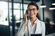 Portrait of a knowledgeable and experienced loan officer with a friendly smile and a phone in her hand, ready to assist clients with their financial needs, generative ai