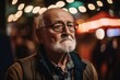 © Robert MEYNER - Portrait of senior man with eyeglasses looking away at night