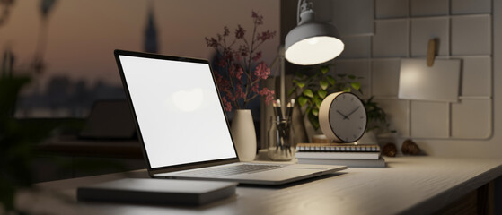 Canvas Print - close-up side view image of modern workspace at night with laptop mockup