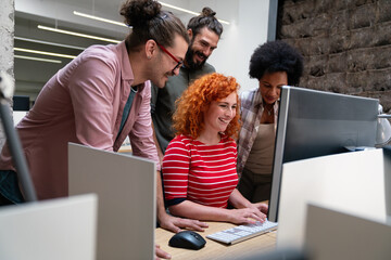 Programmers cooperating at IT company developing apps. People business work office concept