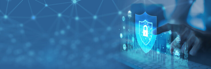 Young businesswoman is using laptop for cyber security protection.cyber security concept, user privacy security and encryption, secure internet access Future technology and cybernetics, screen padlock