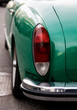 Rear end of green classic car