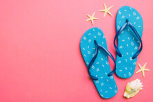Flat Lay Composition With Flip Flops And Seashell On Colored Background. Space For Text Top View