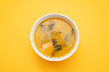 Sticker - Vegetable cream soup with spinach in bowl