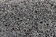 Detailed texture of light granite wall