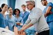 © Jacob Lund - Doctor training a group of medical students using a patient simulator