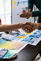 Wall Mural - brainstorm mobile app interface layout design ideas on graphic designer table.ux graphic designer cr