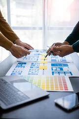 Wall Mural - brainstorm mobile app interface layout design ideas on graphic designer table.ux graphic designer cr