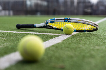 tennis ball on tennis grass court