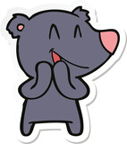 Fototapeta Kosmos - sticker of a laughing bear cartoon