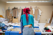 © Anfisa&friends/Stocksy - dress designer cuts fabric