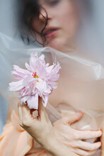 Sensual Woman With Pink Flower