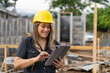 © Leonardo Borges Nuñez/Stocksy - Portrait of a woman in a construction site