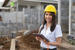 © Leonardo Borges Nuñez/Stocksy - Portrait of a woman in a construction site