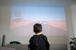 © Hernandez & Sorokina/Stocksy - Anonymous Kid In Front Of View Of Video Game