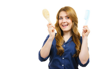 Wall Mural - Girl long hair with comb brush