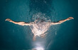 © Ibai Acevedo/Stocksy - Dreamy portrait of submerged woman inside pool