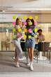 © BONNINSTUDIO/Stocksy - Business professionals brainstorming using adhesive notes in office