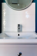 © Gemma can fly/Stocksy - Bathroom sink and mirror