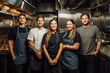 © bluebeat76 - Advertising portrait shot of a cheff team standing together in a restaurant kitchen and they look at the camera. Generative AI.