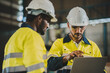 © chokniti - professional business industry technician wearing safety helmet working to maintenance service and checking factory equipment, a work of engineer occupation in manufacturing construction technology