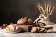 © zhouyilu - Rustic bread roll or french baguette, wheat and flour on black chalkboard. Rural kitchen or bakery - background with free text space.