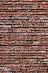 Wall Mural - Vertical photo old decorative wall made of red bricks.