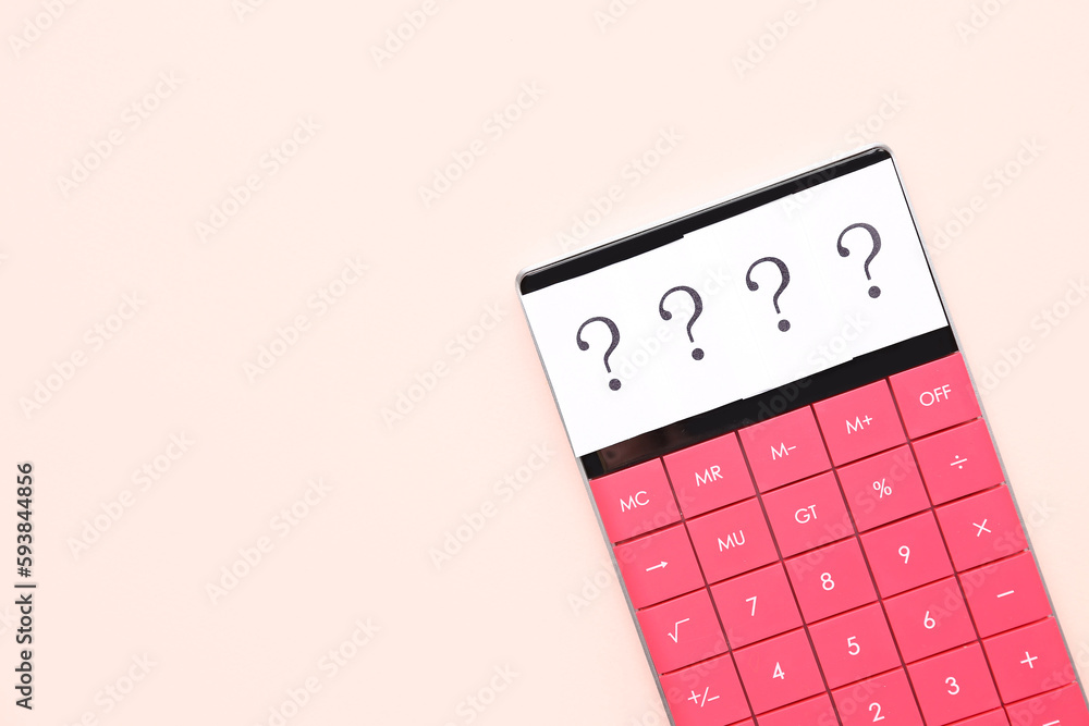 Calculator with question marks on beige background