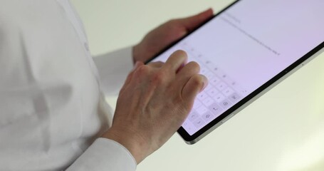 Wall Mural - Female hands are typing test messages on tablet computer. Application and business correspondence in online chat