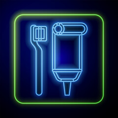 Wall Mural - Glowing neon Toothbrush and tube of toothpaste icon isolated on blue background. Disposable bathroom supplies. Vector