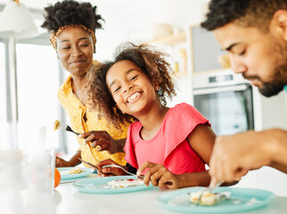 Wall Mural - family child kitchen food daughter mother love eating preparing pancake breakfast  happy together black dessert