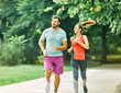 fitness woman park exercise lifestyle outdoor sport healthy couple nature active young fit training athlete man