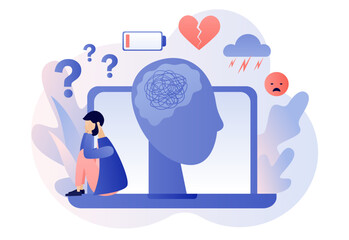 Wall Mural - Depression mental. Depressed man sitting on laptop. Mental health and psychotherapy concept. Anxiety, stress, emotional burnout and other psychological problems. Modern flat cartoon style. Vector 