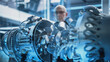 © Gorodenkoff - Middle Aged Industrial Engineer Working on a Futuristic Jet Engine, Standing with Laptop Computer in Scientific Technology Lab. Scientist Developing a New Electric Motor in a Research Facility.
