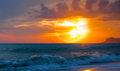 Poster - Beautiful landscape with solar eclipse over the sea at amazing sunset