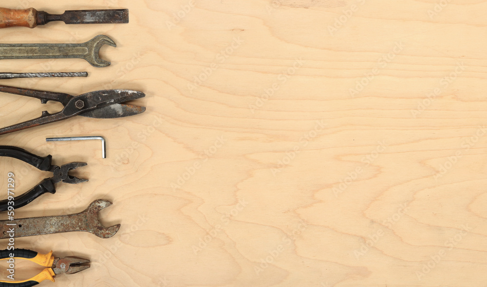 Tools for different repair work, top view. Old tools are laid out in a ...