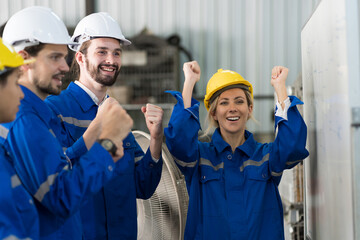 Group of male and female worker meeting, discuss, training and present of work on whiteboard in factory