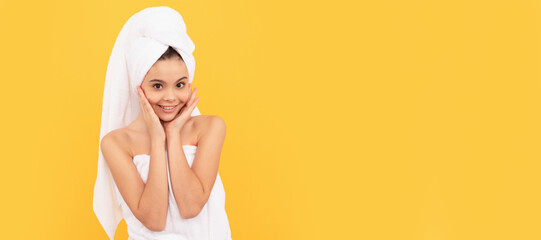 Canvas Print - cheerful teen child in shower towel with cream on face. Cosmetics and skin care for teenager child, poster design. Beauty kid girl banner with copy space.