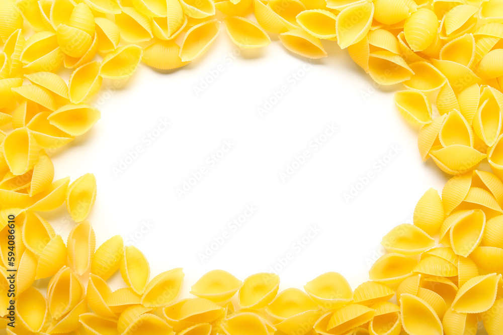 Frame made of raw conchiglie pasta on white background