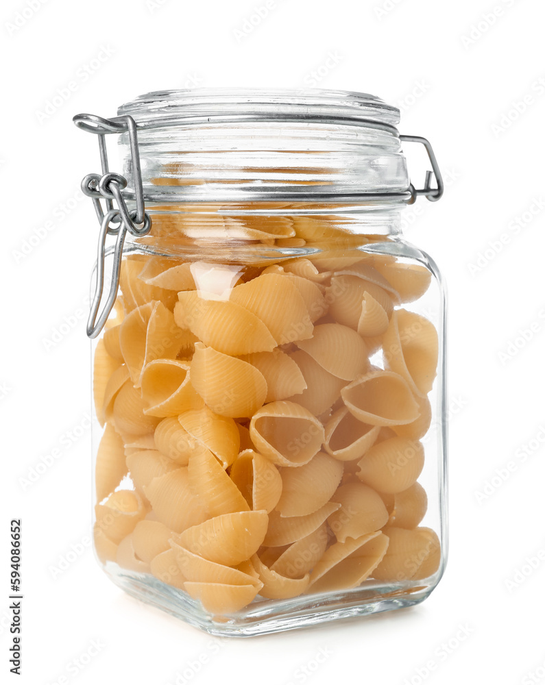 Jar of raw conchiglie pasta isolated on white background