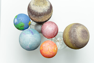 styrofoam balls are painted with paints in the solar system. homework solar system. space planets