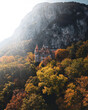 canvas print picture - Imperial Castle hidden among the autumn