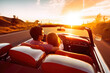 © MVProductions - Happy couple driving into sunset in convertible. High quality generative ai